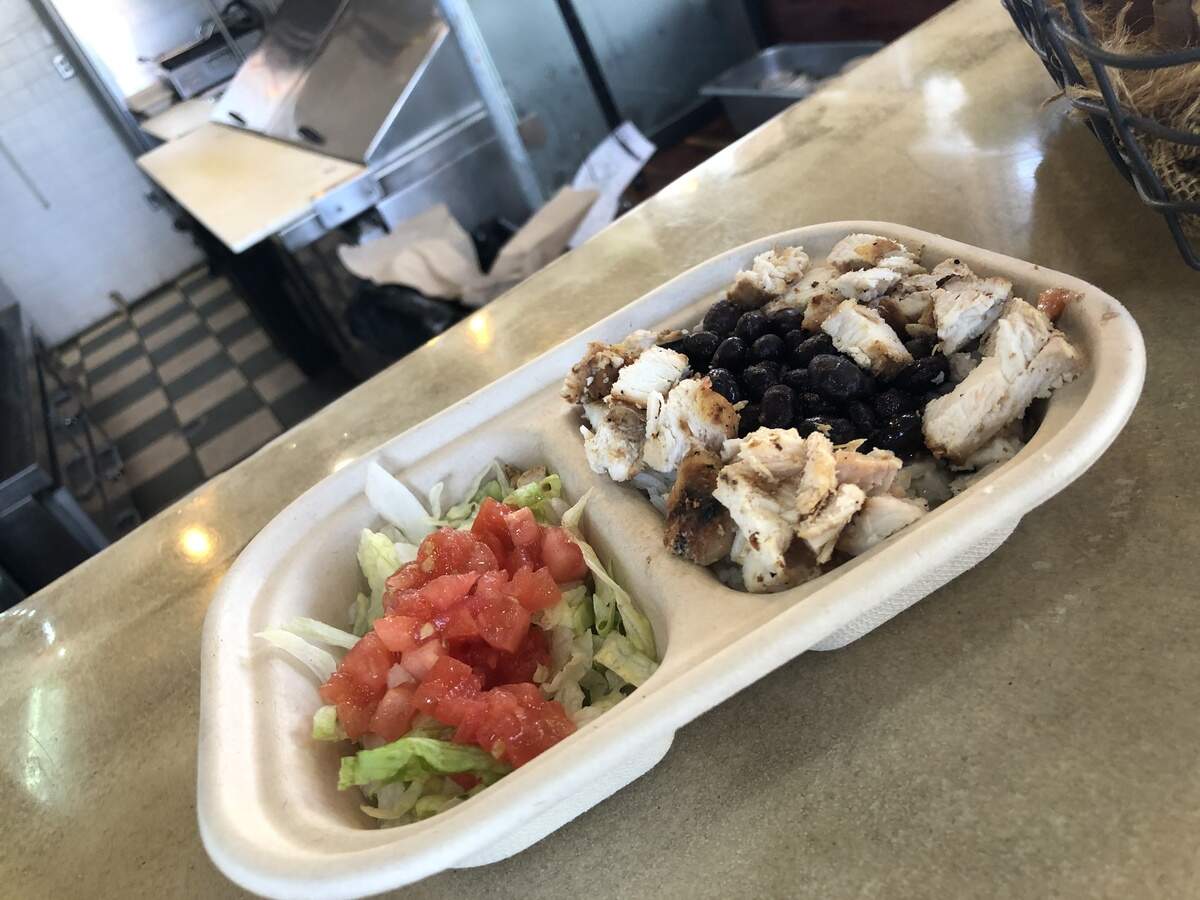 Each Diced kids meal includes chunks of chicken, topped with rice, black beans, lettuce and diced tomatoes with dressing.