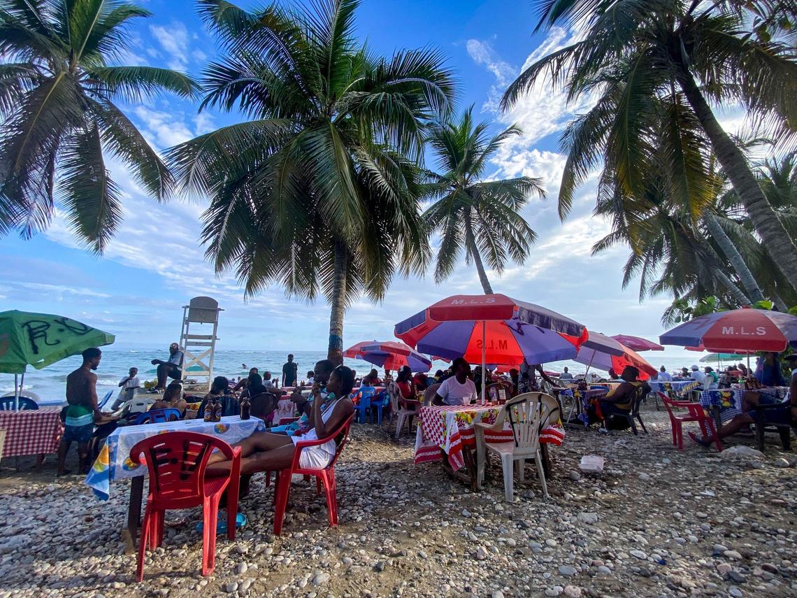 People on the beach in Jacmel on Aug. 25, 2024. Residents in the port city in southeast Haiti fear that the gang violence of Port-au-Prince and its outskirts will eventually reach them.