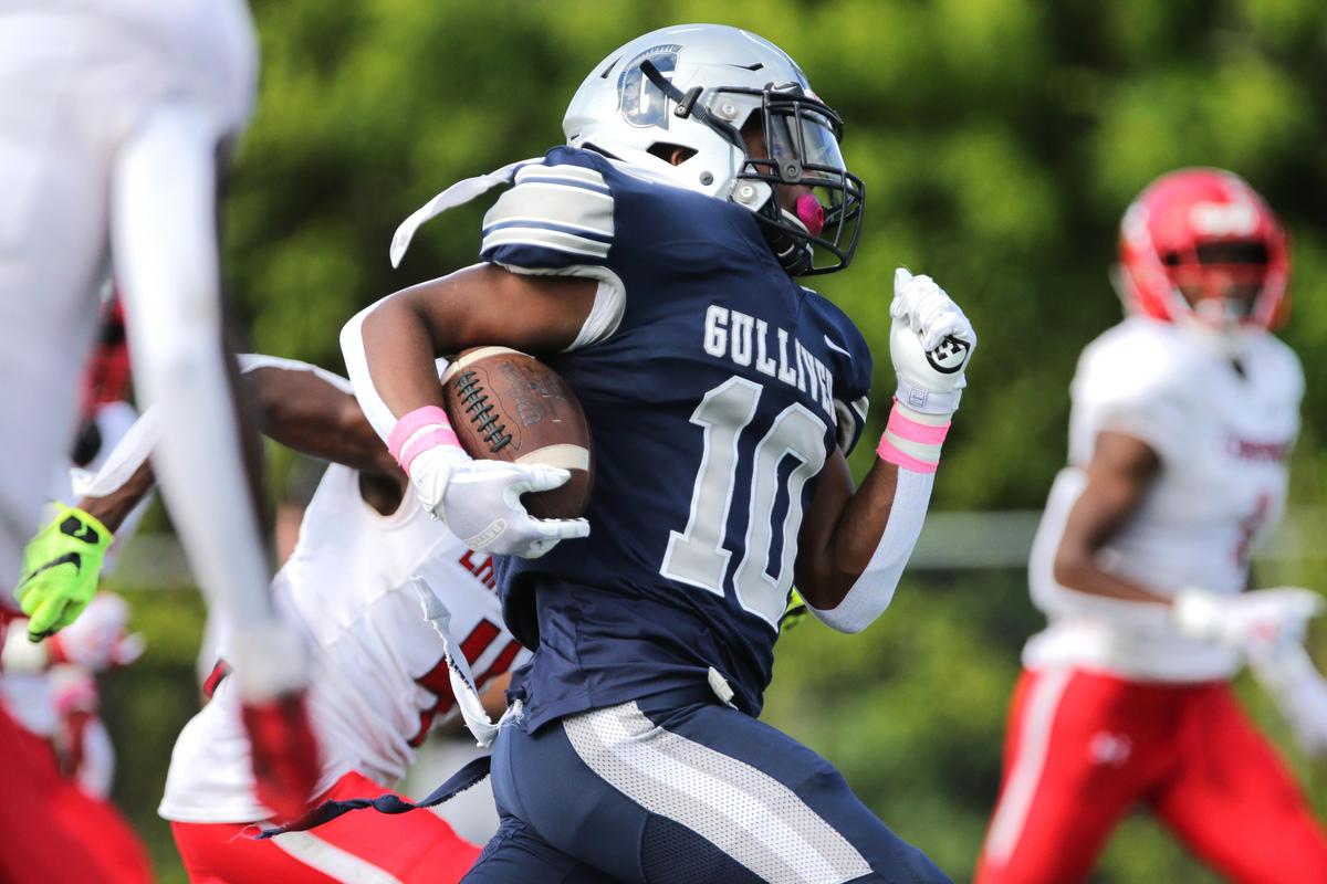 Gulliver Prep Raiders free safety Gabriel Taylor (10) runs the ball in the first quarter of the game against the Champagnat Catholic Lions at Gulliver Prep in Pinecrest, Florida, on Friday, October 25, 2019.