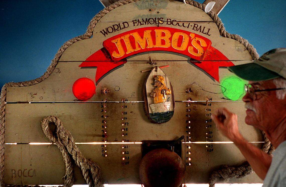 In 2000, Jack Hunt moves in to change the score on the bocce ball scoreboard.