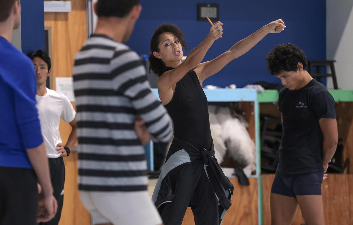 Choreographer Claudia Schreier, right, instructs dancers during the rehearsal for her premiere ballet with members of the Miami City Ballet inside their Miami Beach studios.