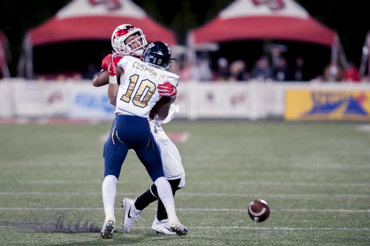 FIU’s Jordan Underwood (82) breaks up a pass intended for Western Kentucky tight end Kris Leach (82) Saturday, October 27, 2018, during a game at Houchens-Smith Stadium.