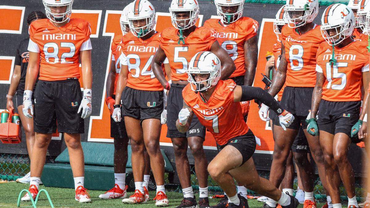Miami Hurricanes wide receiver Xavier Restrepo (7) runs practice drills at Greentree Practice Field at the University of Miami in Coral Gables on Friday, August 5, 2022.
