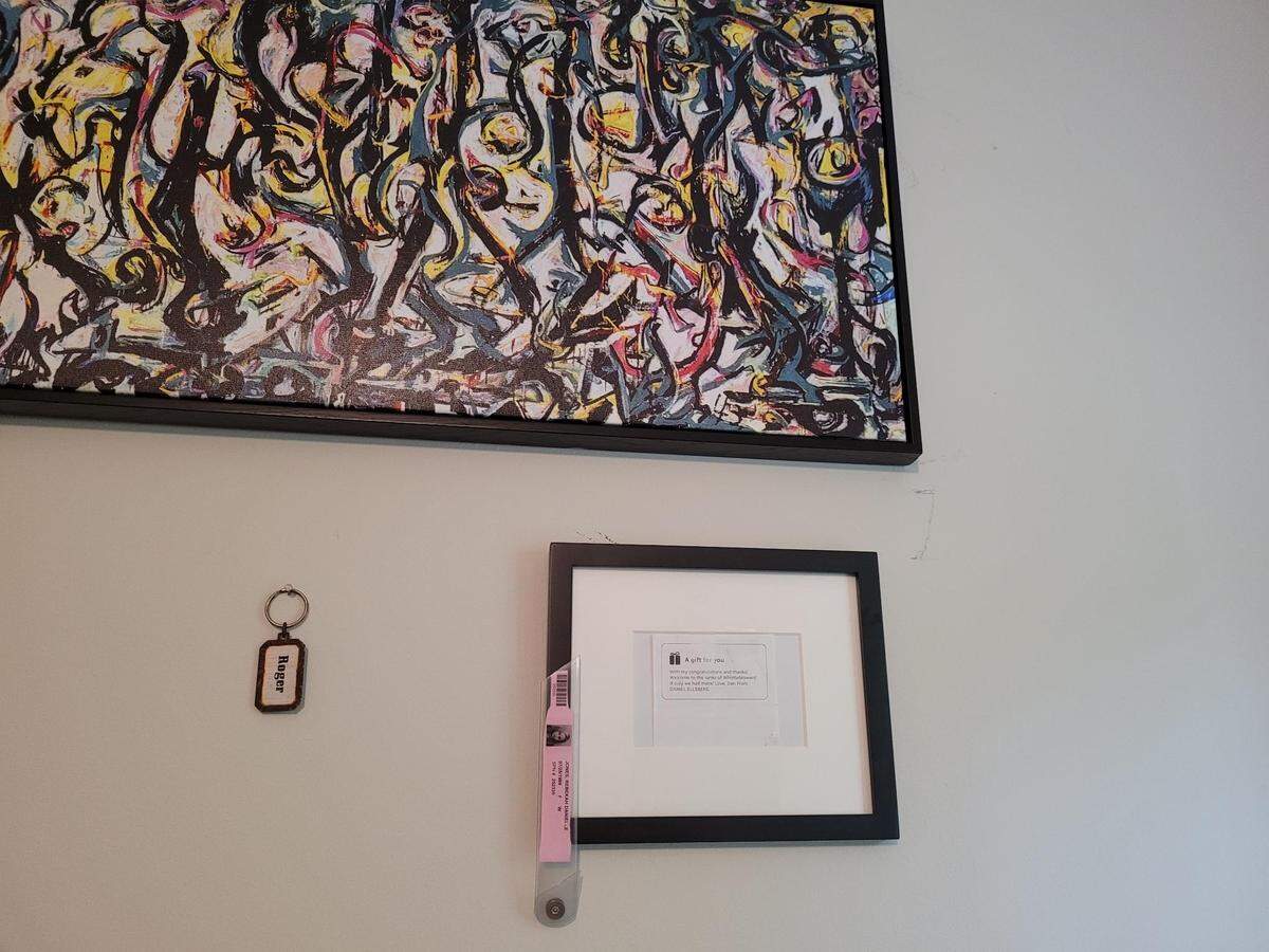A note attached to a gift sent by famous whistleblower Daniel Ellsberg hangs on Rebekah Jones’ bedroom wall.