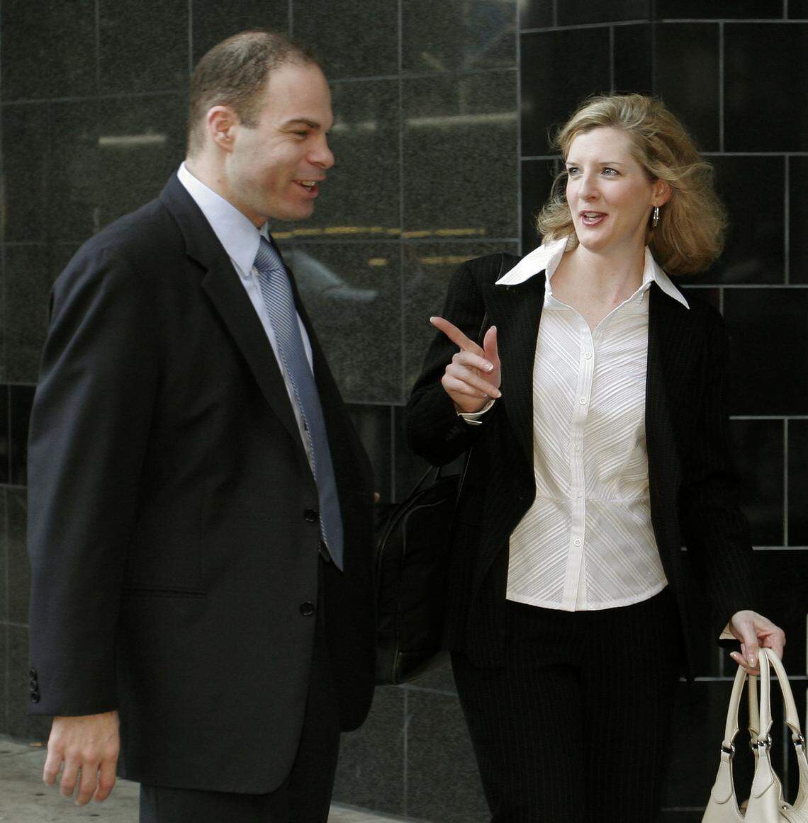 HOUSTON - MAY 2:  Prosecutors Sean Berkowitz and Kathryn Ruemmler arrive at the Bob Casey U.S. Courthouse for the fraud and conspiracy trial of former Enron executives Kenneth Lay and Jeff Skilling May 2, 2006 in Houston, Texas. After six days on the stand, Lay will finish his testimony, according to reports.  (Photo by Dave Einsel/Getty Images)