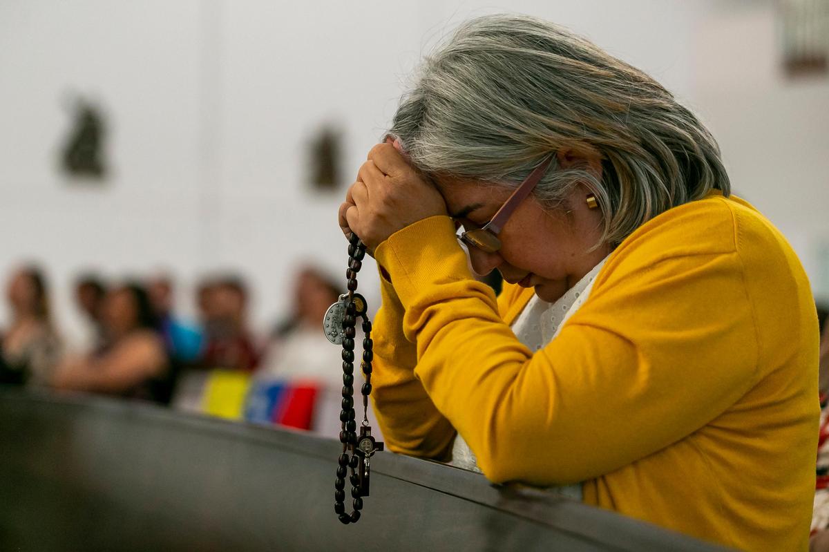 Irma Lugo prays the Rosary during a service at Our Lady of Guadalupe Catholic Church in Doral, Florida, on Tuesday, April 30, 2019. Those gathered prayed the Rosary for peace and freedom in Venezuela.