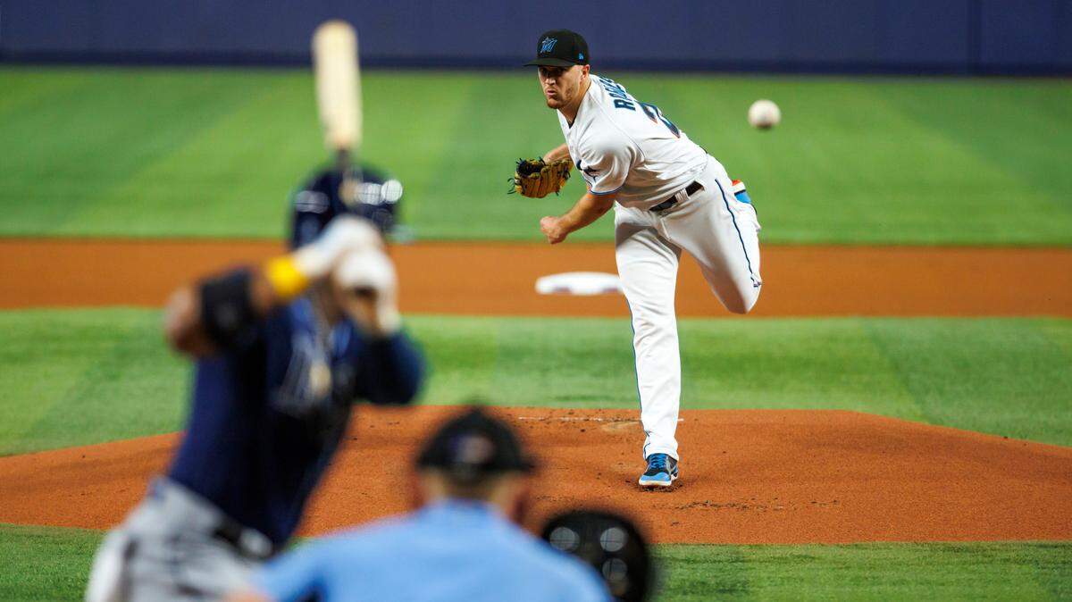 Miami Marlins starting pitcher Trevor Rogers (28) pitches to Tampa Bay Rays third baseman Yandy Diaz (2) during the first inning of a baseball game at LoanDepot Park on Wednesday, August 31, 2022 in Miami, Florida.