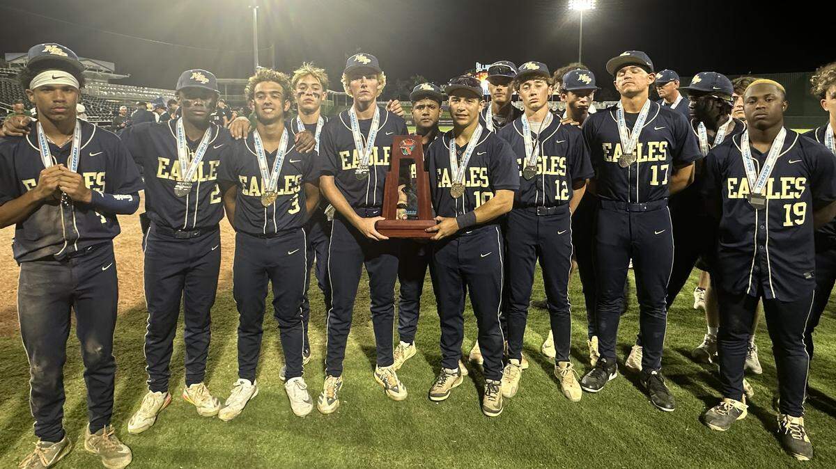 North Broward Prep poses with the Class 3A state runner-up trophy after losing to Santa Rosa Beach South Walton on Thursday night at Hammond Stadium in Fort Myers, Fla.