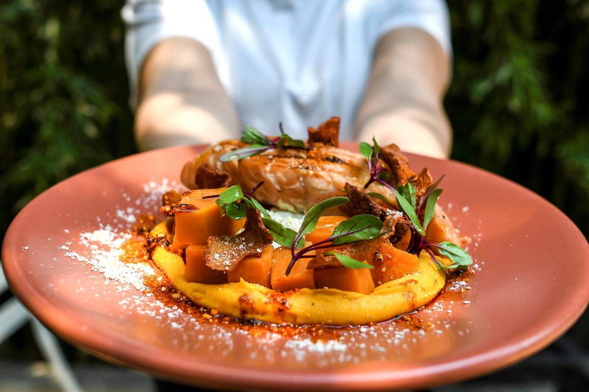 Sweet potato and papantla vanilla salad with salmon from Ojo De Agua Miami.