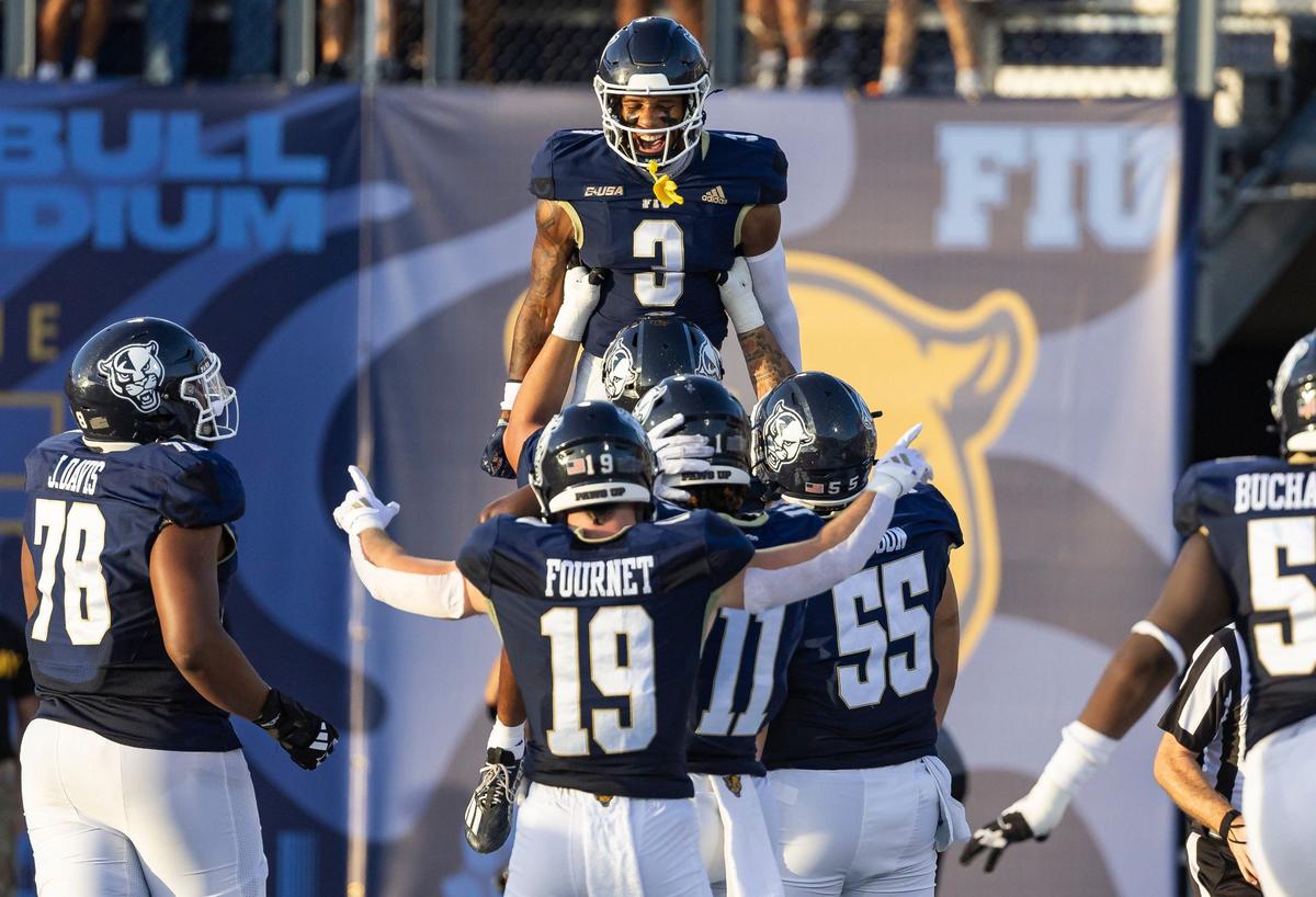 FIU Panthers wide receiver Eric Rivers (3) celebrates with this teammates after scoring a touchdown against the Central Michigan Chippewas in the second quarter of their NCAA DI football game at Pitbull Stadium on Saturday, Sept. 7, 2024, in Miami, Fla.