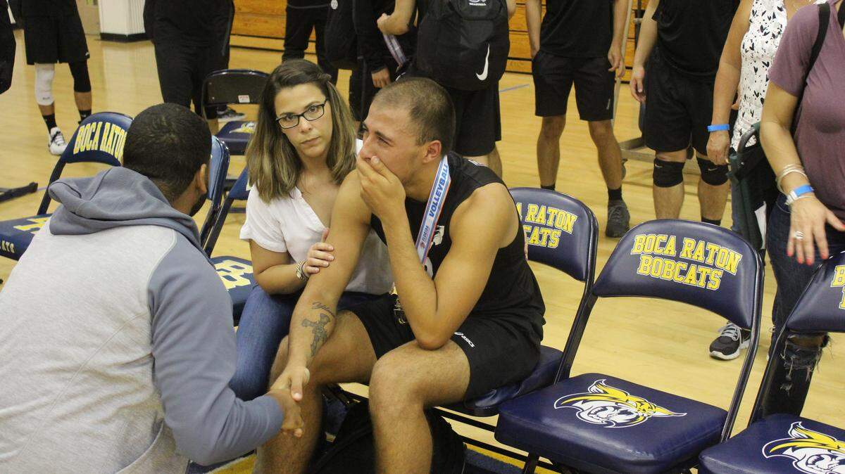 Consoled by his mother, Daniel Pupiro was one of many Southwest players virtually inconsolable following their state championship game loss to Orlando Freedom on Saturday night at Boca Raton High School.