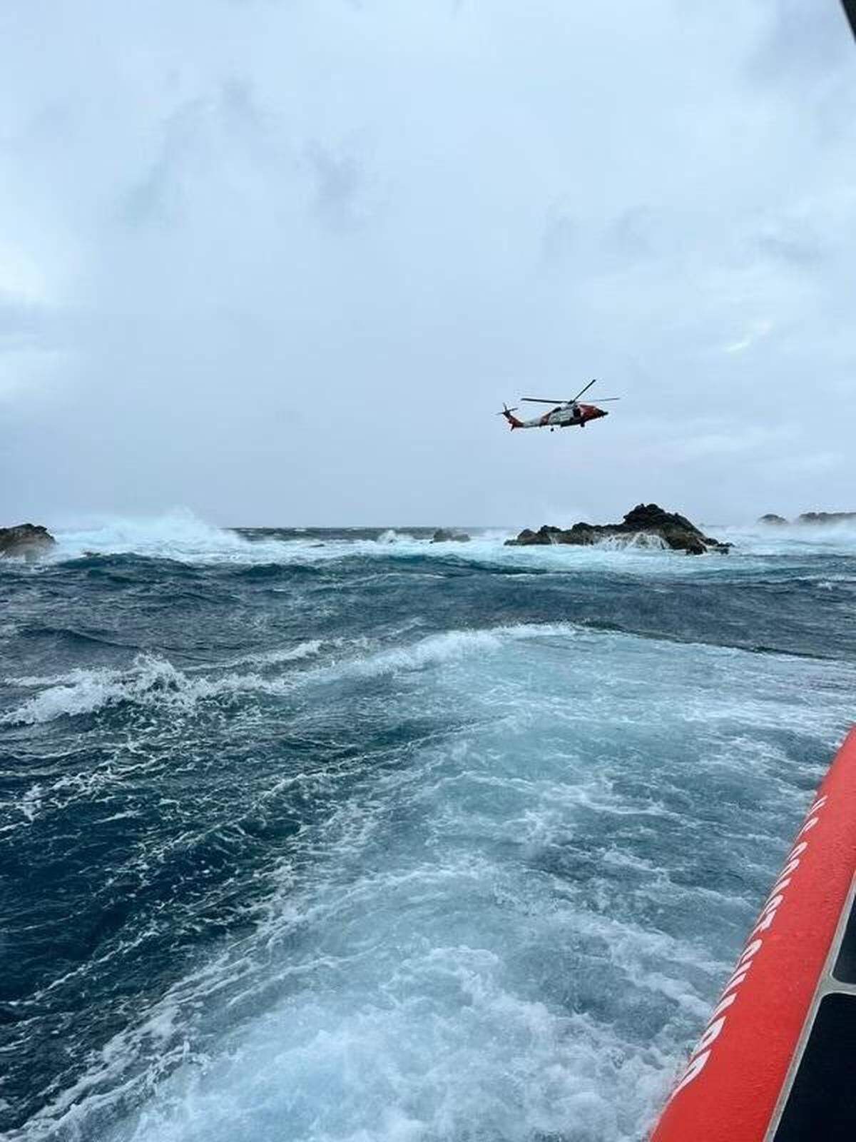 U.S. Coast Guard crews in a 33-foot Special Purpose Craft and a Coast Guard MH-60T Jayhawk helicopter rescued a spear fisherman from rocks just off Dog Island in U.S. Virgin Islands waters on Sept. 4, 2022.