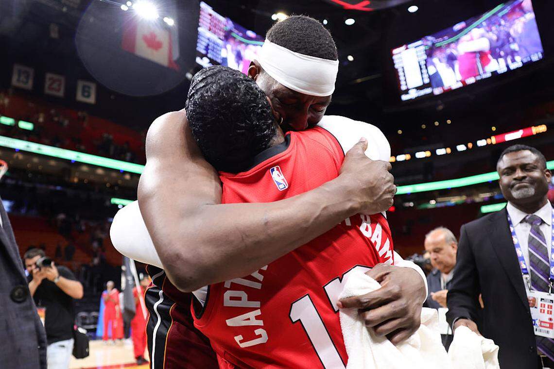 Bam Adebayo #13 of the Miami Heat embraces his mother after a 150-129 win over the Washington Wizards at Kaseya Center on March 10, 2026 in Miami,.