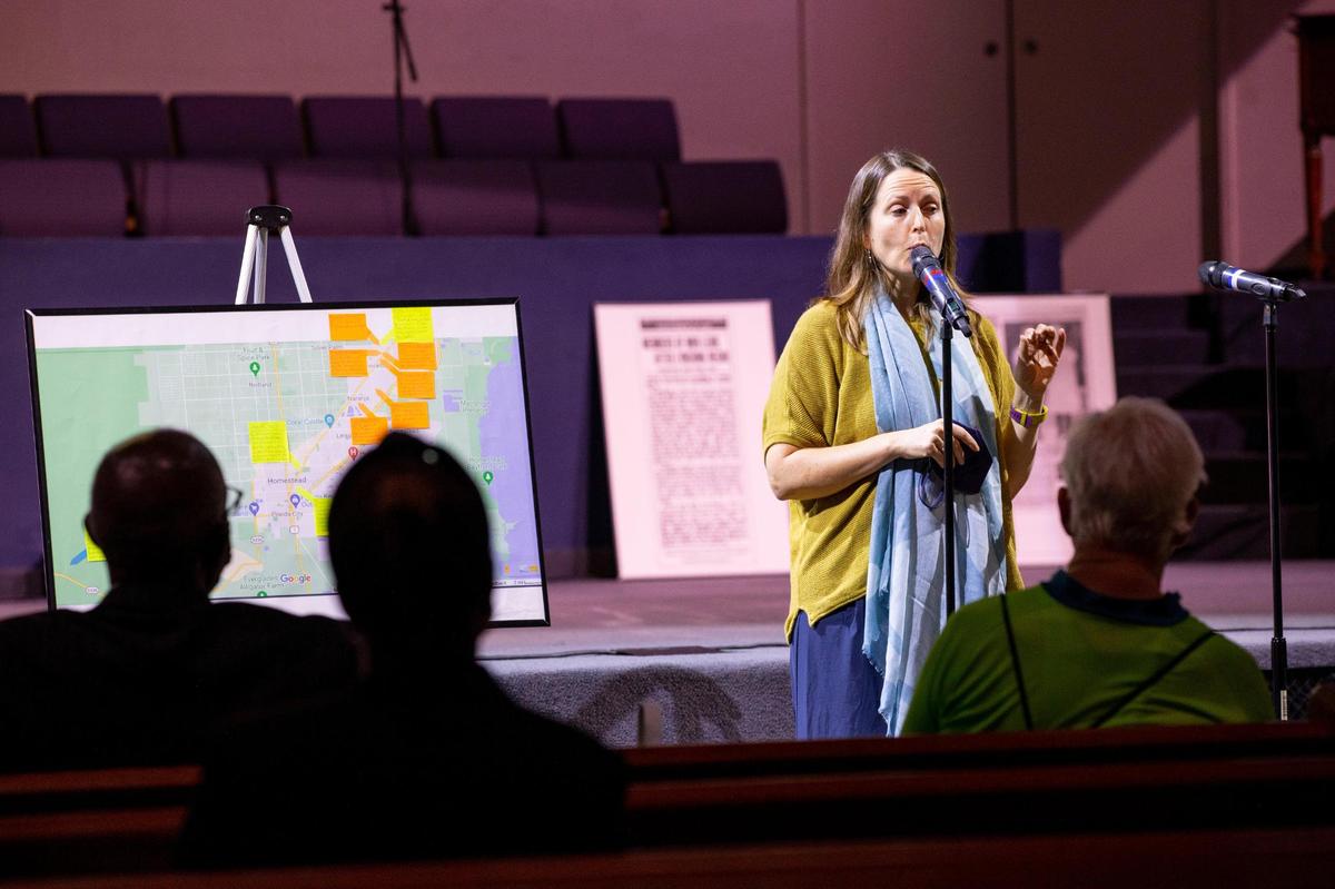 Courtney A. Berrien, co-chair of Barry University’s Anti-racism and Equity Coalition, speaks to a crowd of roughly 50 people about the lynching of three black men, J.B. Harris, William Simmons, and Roy Gaines, near Homestead, Florida, in the 1920s. Berrien spoke during a discussion on the history of racial violence of South Florida hosted by Miami-Dade TEAR at Sweet Home Missionary Baptist Church in West Perrine, Florida, on Saturday, Nov. 13, 2021.