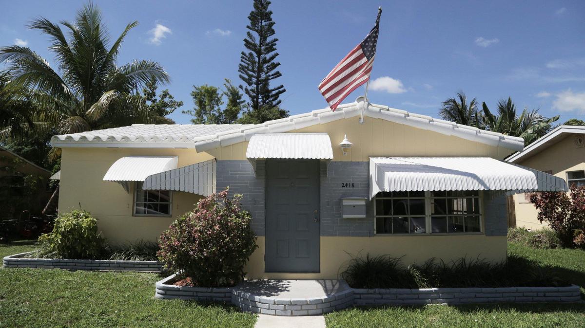 Many state and local governments offer assistance with down payments and closing costs. Above: A single-family home on Scott Street in Hollywood.