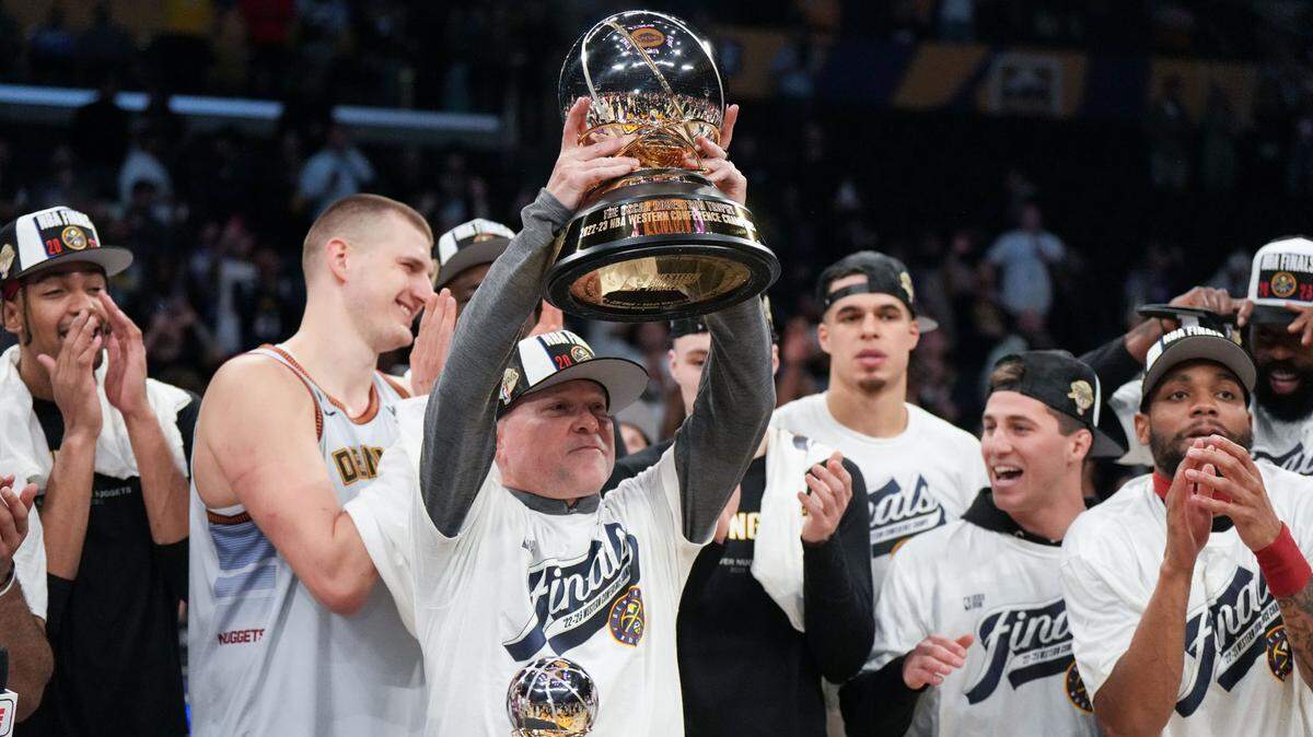 Denver Nuggets head coach Michael Malone celebrates beating the Los Angeles Lakers in game four of the Western Conference Finals for the 2023 NBA playoffs at Crypto.com Arena.
