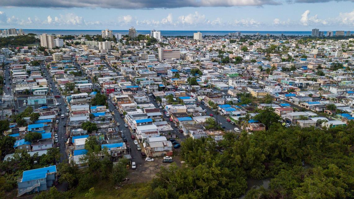 Many homes in the Cao Martin Pea communities in San Juan, Puerto Rico still lack permanent roofs on August 24, 2018 a year after Hurricane Maria.