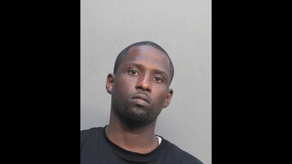 Miami Beach police arrested Chami Moubarack, a 30-year-old fugitive wanted for robbery, after a chase ended with a car crash and a manhunt through the Miramar Condominium building early Friday morning.