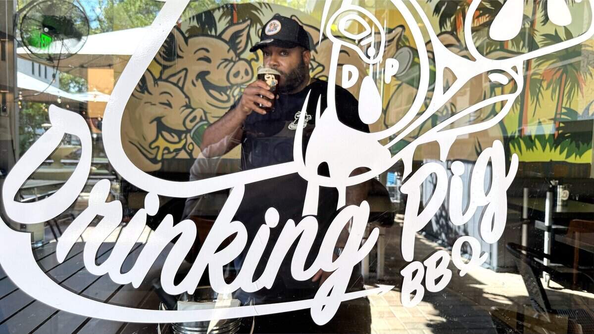What started as a popular pop-up barbecue stop in a North Miami front yard during the pandemic has transformed into Raheem Sealey's first brick-and-mortar, Drinking Pig BBQ, in the heart of Coconut Grove. Raheem Sealey is photographed inside the Grove's newest eatery, the Drinking Pig BBQ on Main Highway, which he plans to open in several days in Coconut Grove, Florida, on Tuesday, November 24, 2025.
