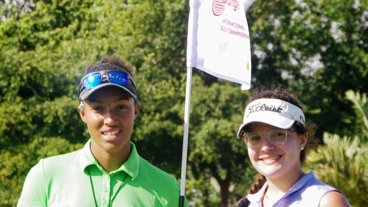 Emily Odwin, left, and Gabriella Chavez struck up a friendship during the first round of the Junior Orange Bowl International Golf Championship on Friday at Biltmore Golf Course in Coral Gables.