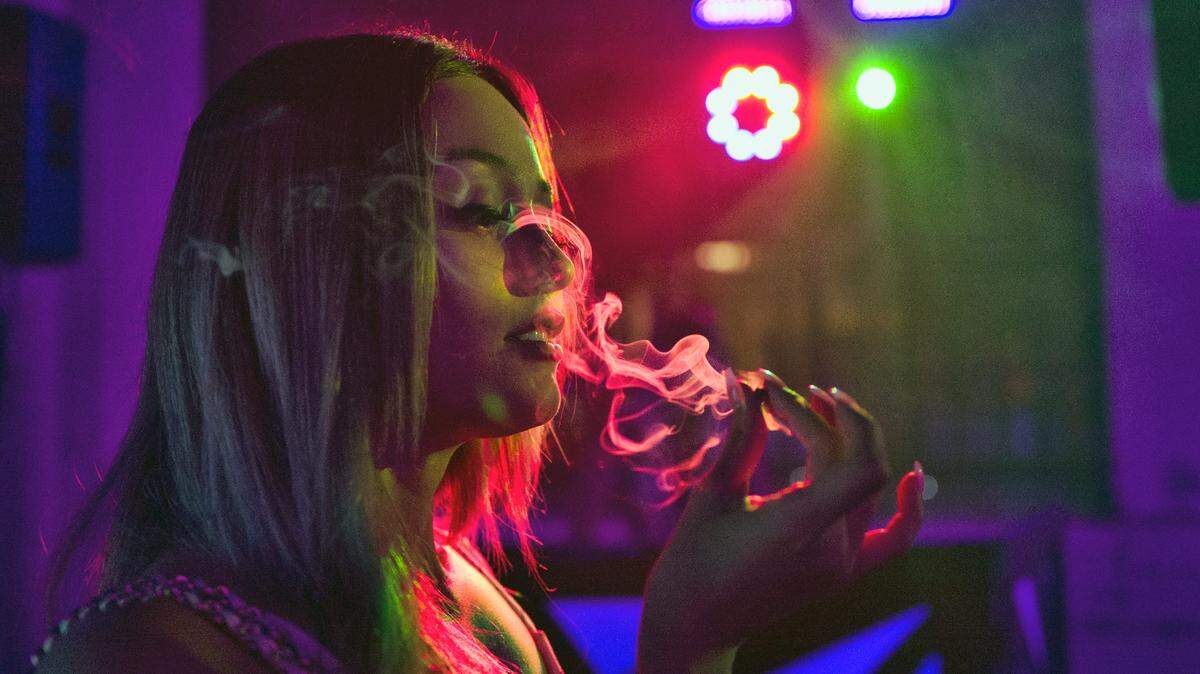 Smoking marijuana can impair a driver’s ability for up to five hours, a study from McGill University in Canada found. But simple tasks like staying on the speed limit and braking weren’t affected, the study said. In this Aug. 28 photo Daniela Higuera from Long Beach, Calif. smokes a marijuana cigarette at Cannect,  a cannabis industry networking mixer in Los Angeles