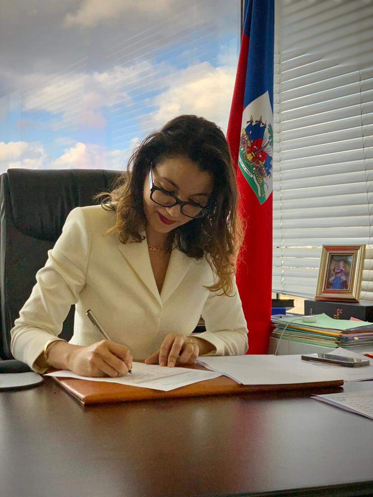 Dominique Dupuy, Haiti’s ambassador to UNESCO, signing the candidacy of soup joumou on Thursday, March 25 in Paris, France for inclusion on the list of Intangible Cultural Heritage of Humanity.