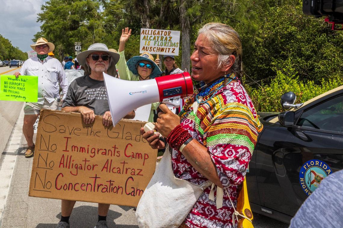 Organizer Betty Osceola speaks to protesters outside of the Dade-Collier Training and Transition Airport during the “Stop Alligator Alcatraz” protest in opposition to the construction of a massive detention facility for undocumented immigrants on the site, which is in the middle of the Florida Everglades, in Ochopee, Florida, on Saturday June 28, 2025.