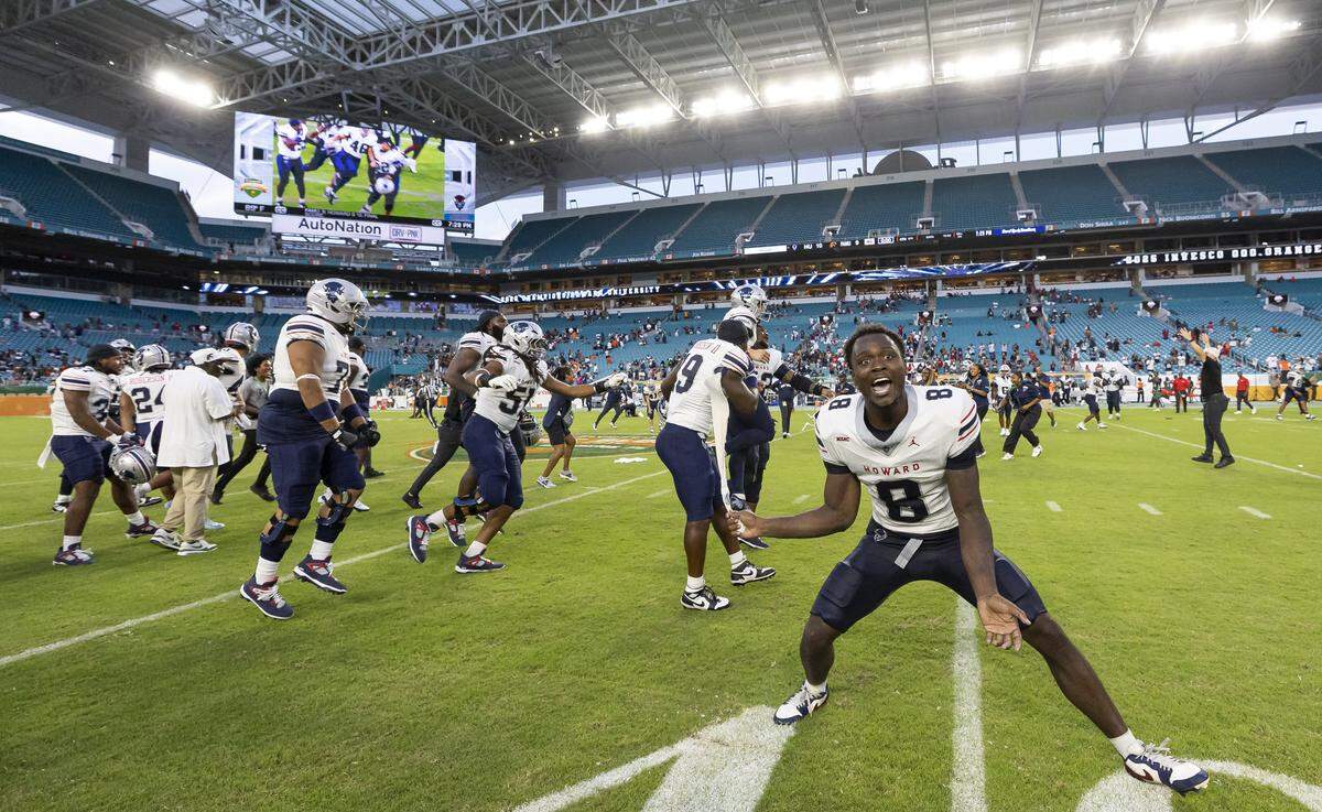 Howard Bison players celebrate after defeating Florida A&M Rattlers in their Orange Blossom Classic football game at Hard Rock Stadium on Saturday, Aug. 30, 2025, in Miami Gardens, Fla.