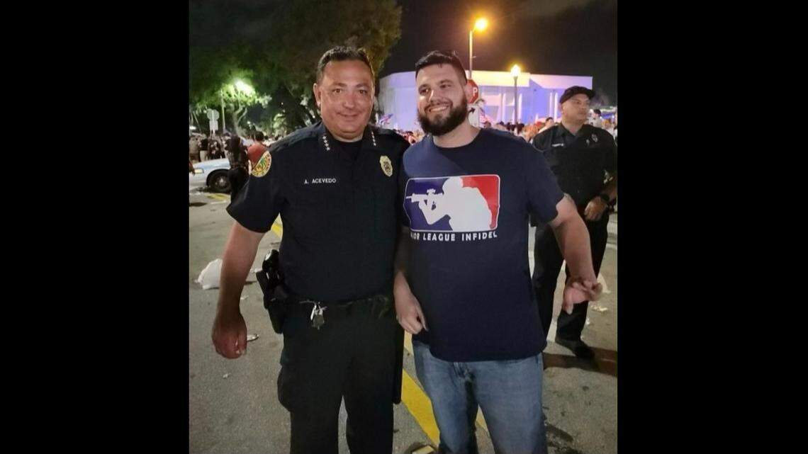 Miami Police Chief Art Acevedo poses with Proud Boys member Gabriel Garcia, who is facing trial for entering the U.S. Capitol on Jan. 6, 2021. Acevedo said he did not know who Garcia was when he took the photo.