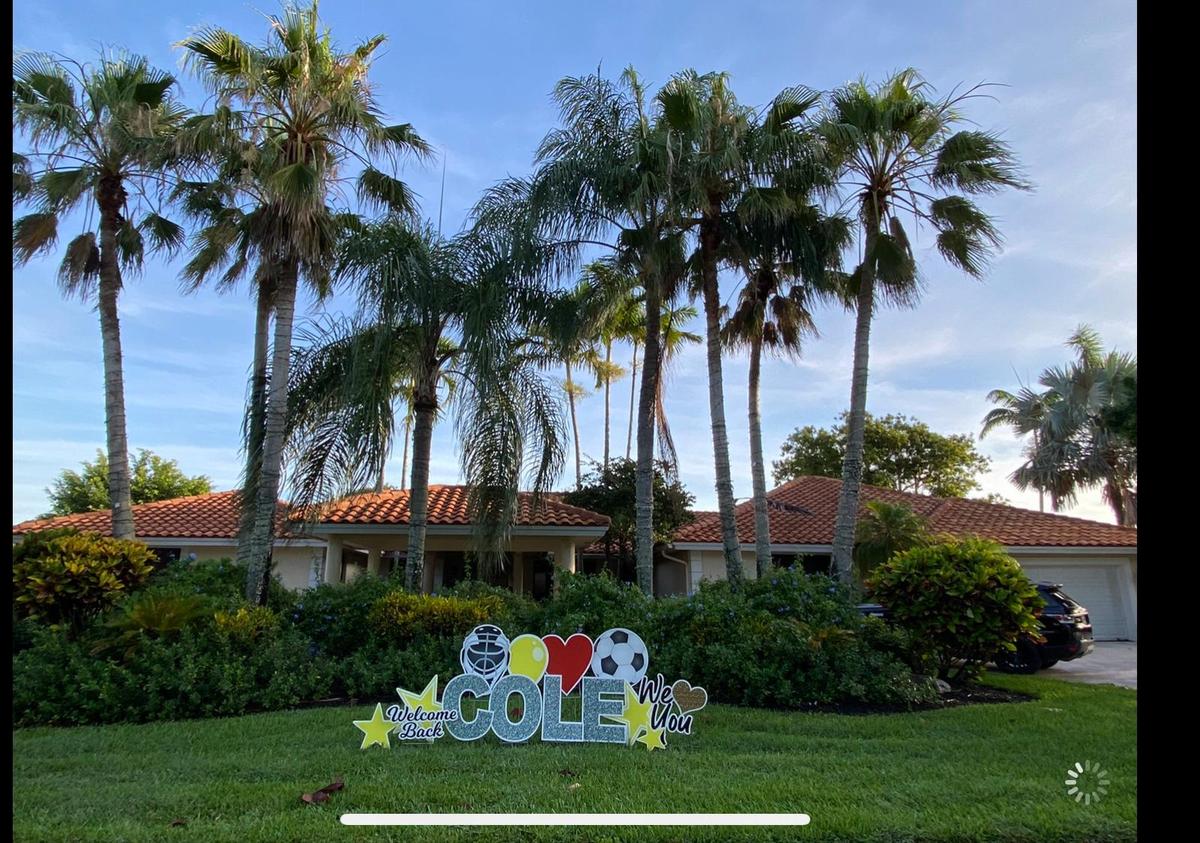 A welcome home sign outside the Vaccarella’s Davie home helps keep Cole’s spirits up.