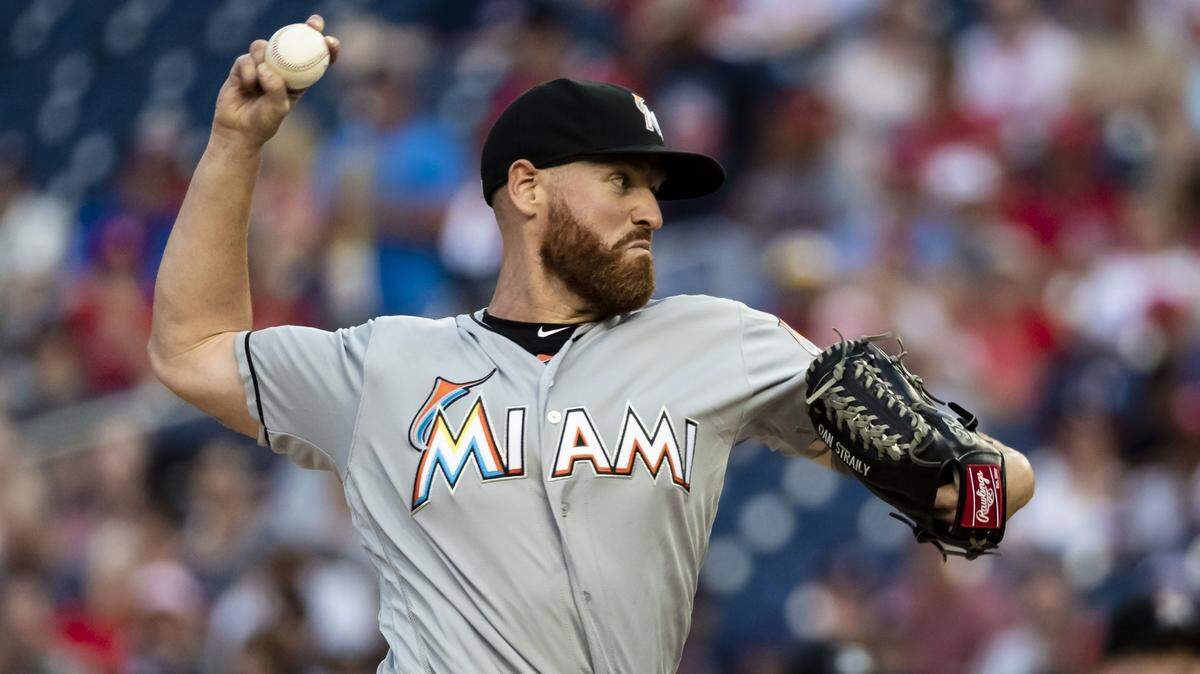 Dan Straily, shown here throwing his new two-seam fastball, is sticking with the pitch that has helped turn his season around.