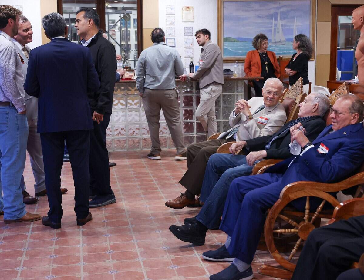 Cuban and Cuban-American entrepreneurs mingle as they gathered for a private event on Tuesday, March 31, 2026, in Miami, Florida, to organize and pledge to invest in Cuba if there is a change in government.