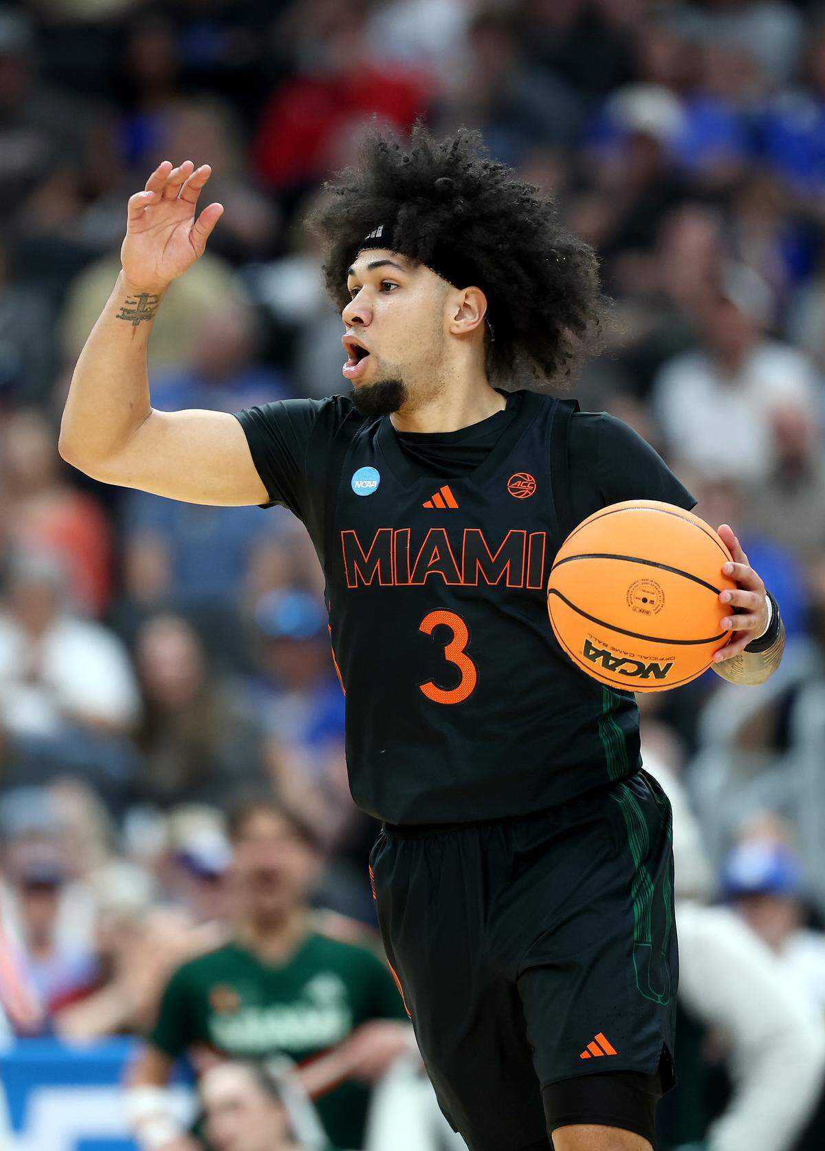 ST LOUIS, MISSOURI - MARCH 22: Tre Donaldson #3 of the Miami Hurricanes reacts against the Purdue Boilermakers in the second round of the 2026 NCAA Men's Basketball Tournament at Enterprise Center on March 22, 2026 in St Louis, Missouri.  (Photo by Jamie Squire/Getty Images)
