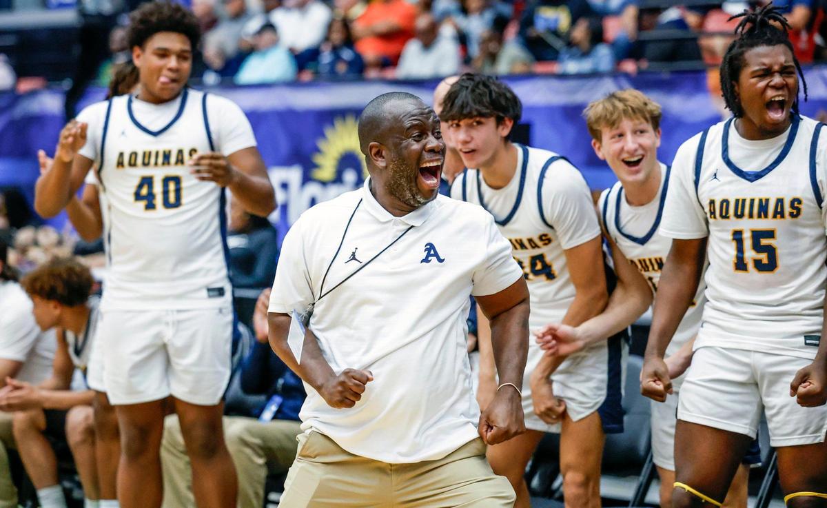 St. Thomas Aquinas Raiders head coach Julius Sandi reacts in the final moments of the game as the Raiders defeat the win Evans for the FHSAA Class 6A Boys High School Basketball State Championship at the RP Funding Center in Lakeland, Florida on Saturday, March 8, 2025.