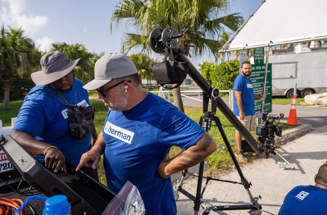 Alex Bailey (left), director of photography, and Antonio “Tony” Tur (right), drone pilot/operator, look back at the footage on the Atomos video monitor in Coral Gables, Fla., on July 11, 2023. Herman says they usually have a shot list and general plan of what they want to accomplish, but sometimes plans do not go accordingly on set. “But then you get out there and it’s sort of like a live performance that is modifying and adapting throughout the day,” he said.