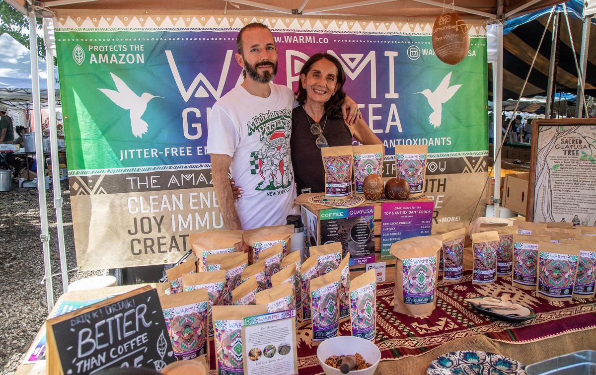 Juan Paez and his mother Jenny Ortiz sell guayusa tea. The tea leaves come from an Amazonian tree.
