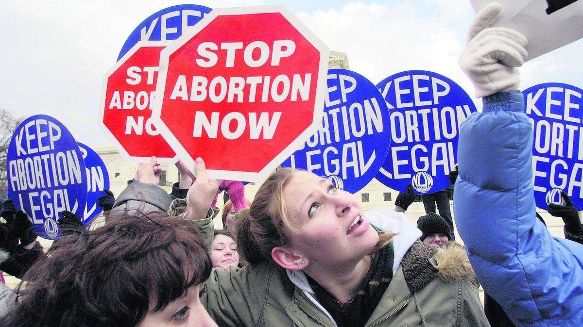 Both sides in the abortion debate protested in front of the U.S. Supreme Court during the 31st annual March for Life in Washington.