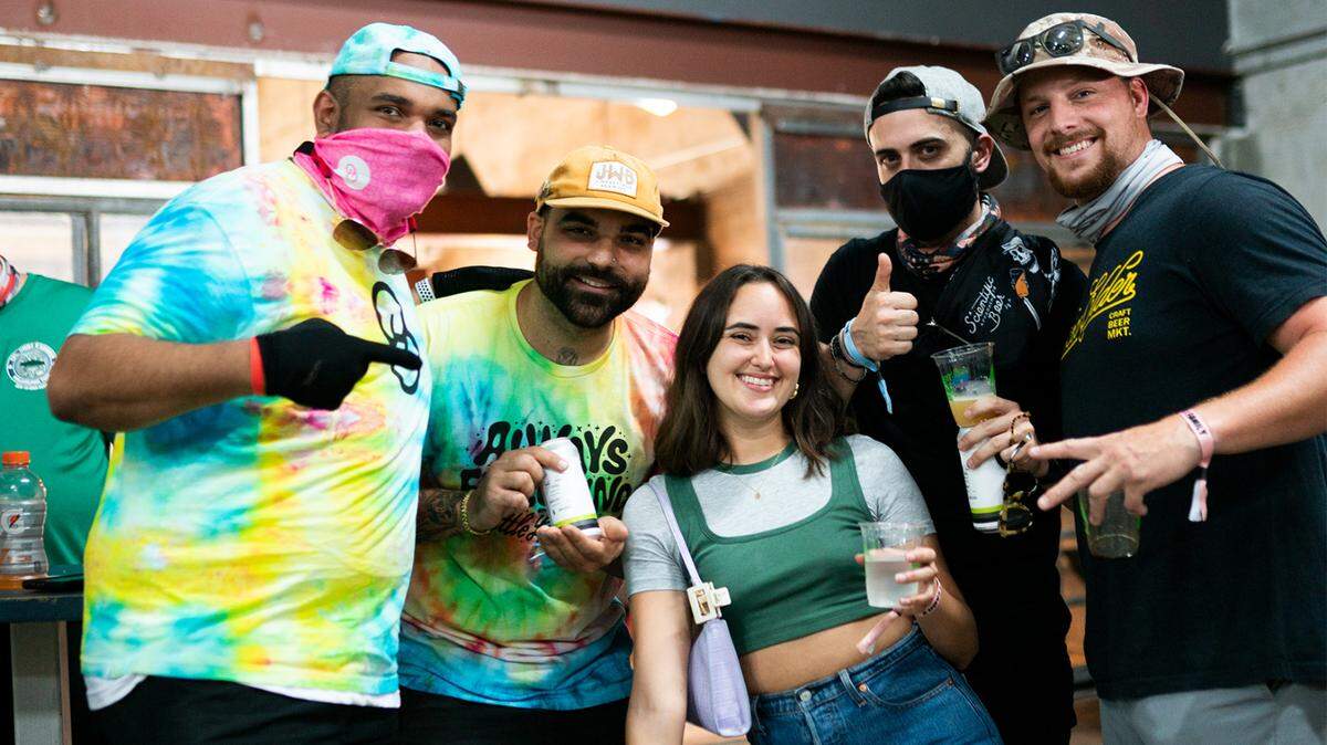 Fans of Tripping Animals brewery in Doral celebrate during the annual beer festival Irie Jungle in 2021. During Miami Beer Week, the annual festival will be a highlighted event.