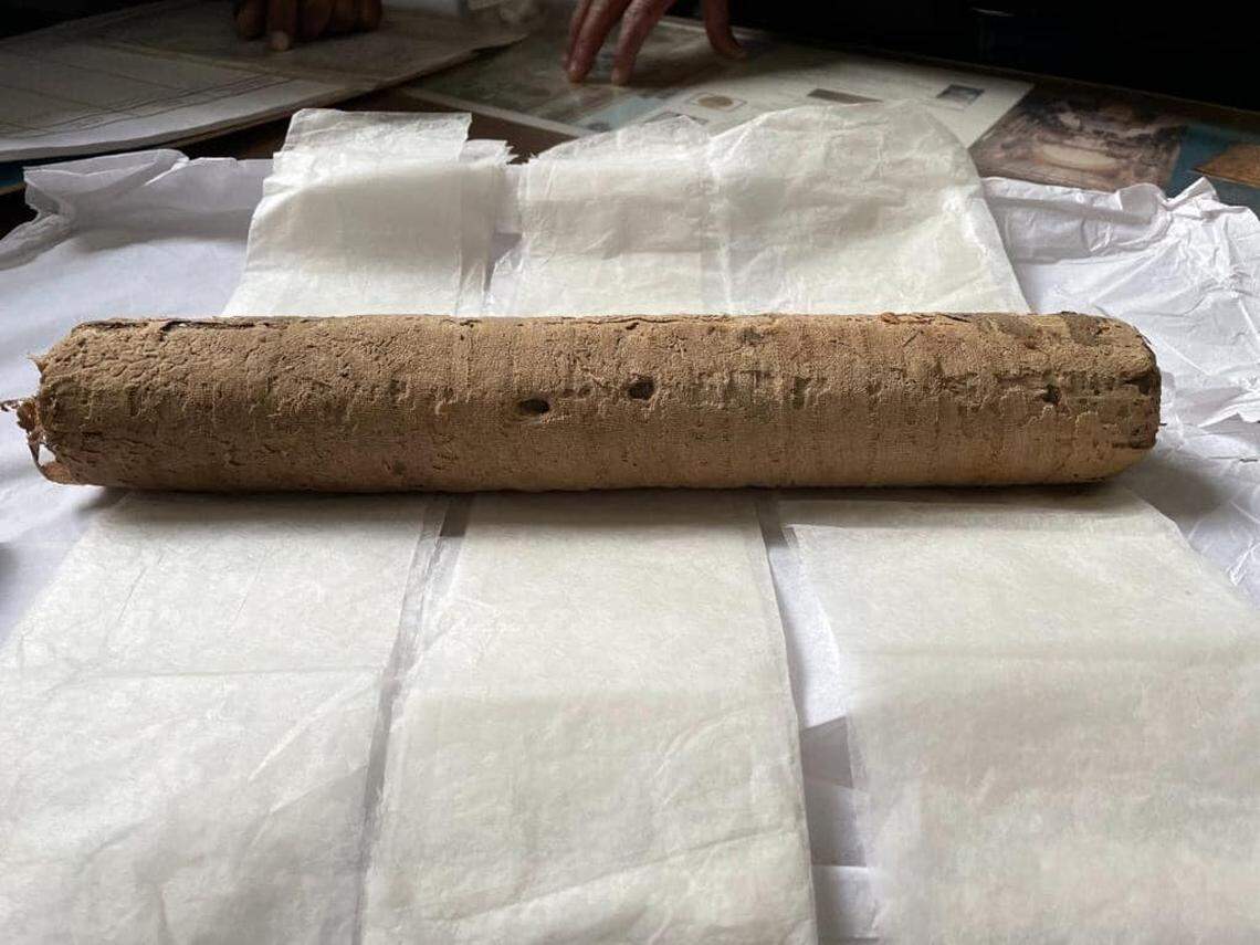 The unopened papyrus scroll.