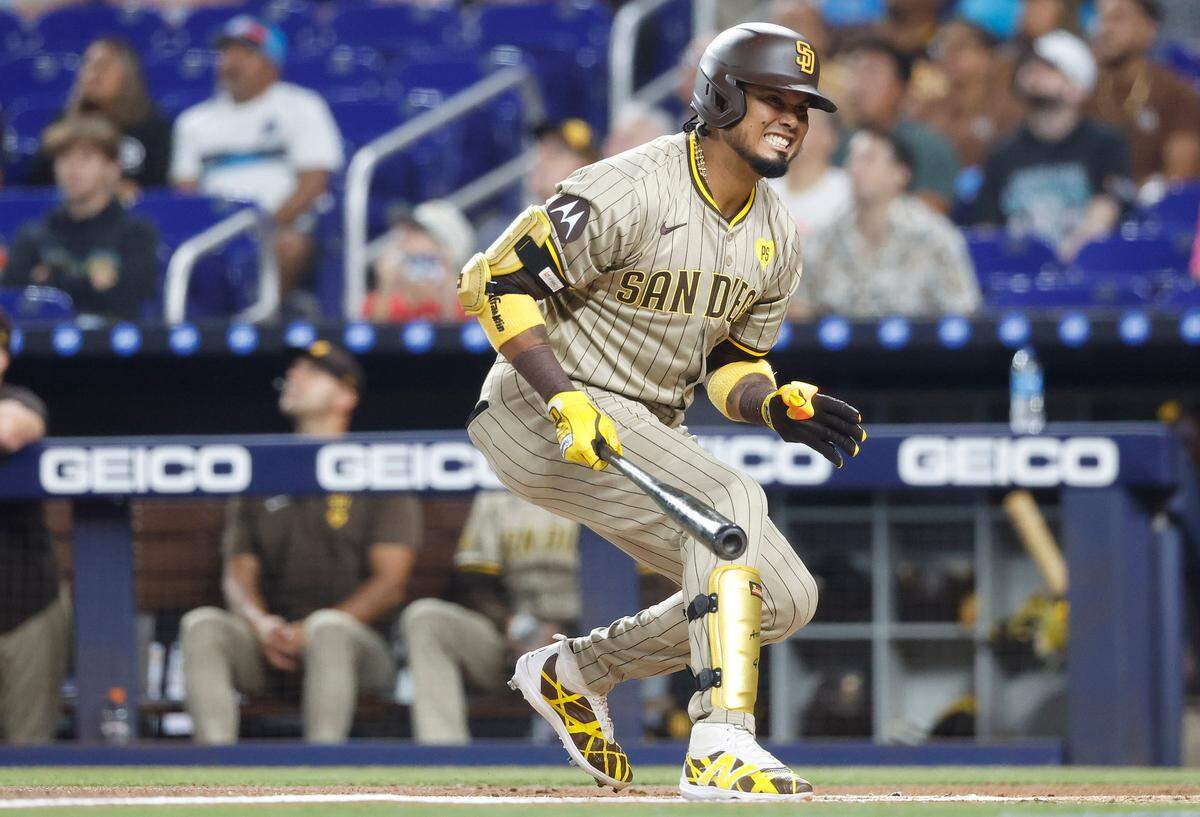 Aug 9, 2024; Miami, Florida, USA; San Diego Padres designated hitter Luis Arraez (4) reacts against the Miami Marlins in the first inning at loanDepot Park. Mandatory Credit: Rhona Wise-USA TODAY Sports