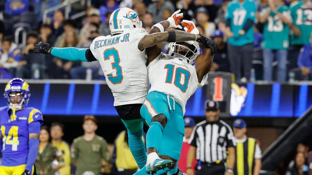 Miami Dolphins wide receiver Odell Beckham Jr. (3) and wide receiver Tyreek Hill (10) celebrate Tyreek’s TD in the end zone in the second half during their NFL football game at SoFi Stadium in Inglewood, California on Monday, November 11, 2024. 
