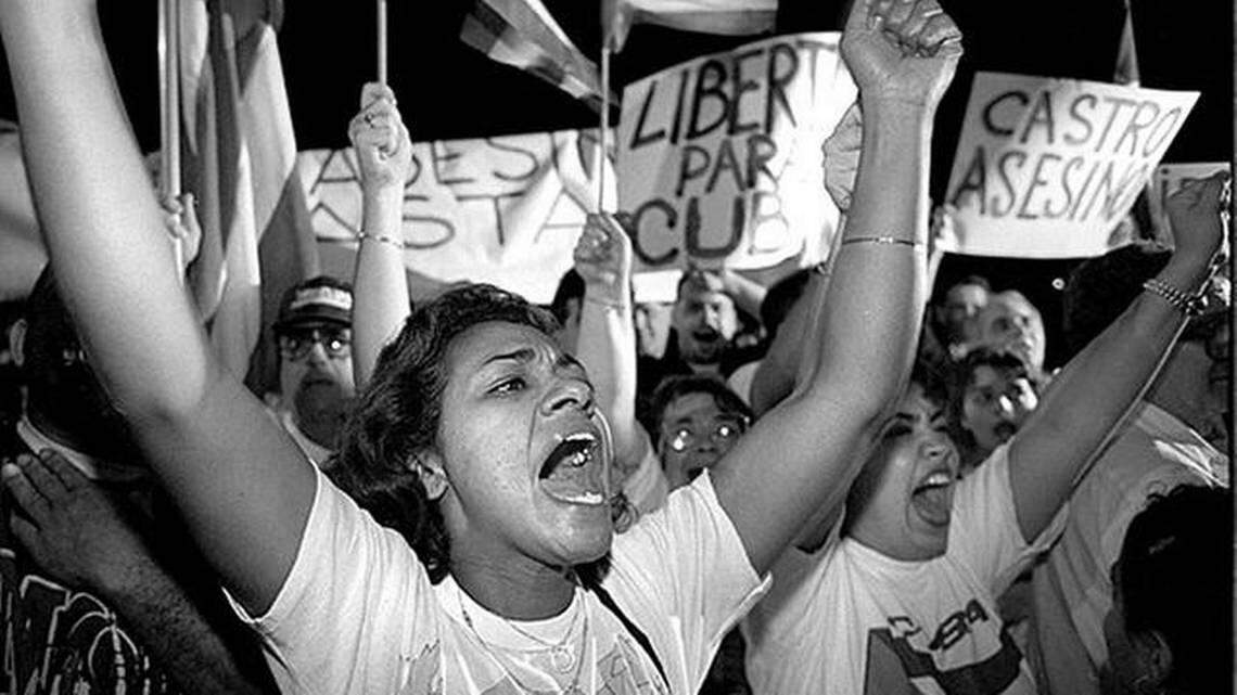 In 1996, hundreds of demonstrators gather outside the Brothers to the Rescue hangar at Opa-Locka Airport, protesting Cuba’s shootdown of two of the organzation’s planes. 