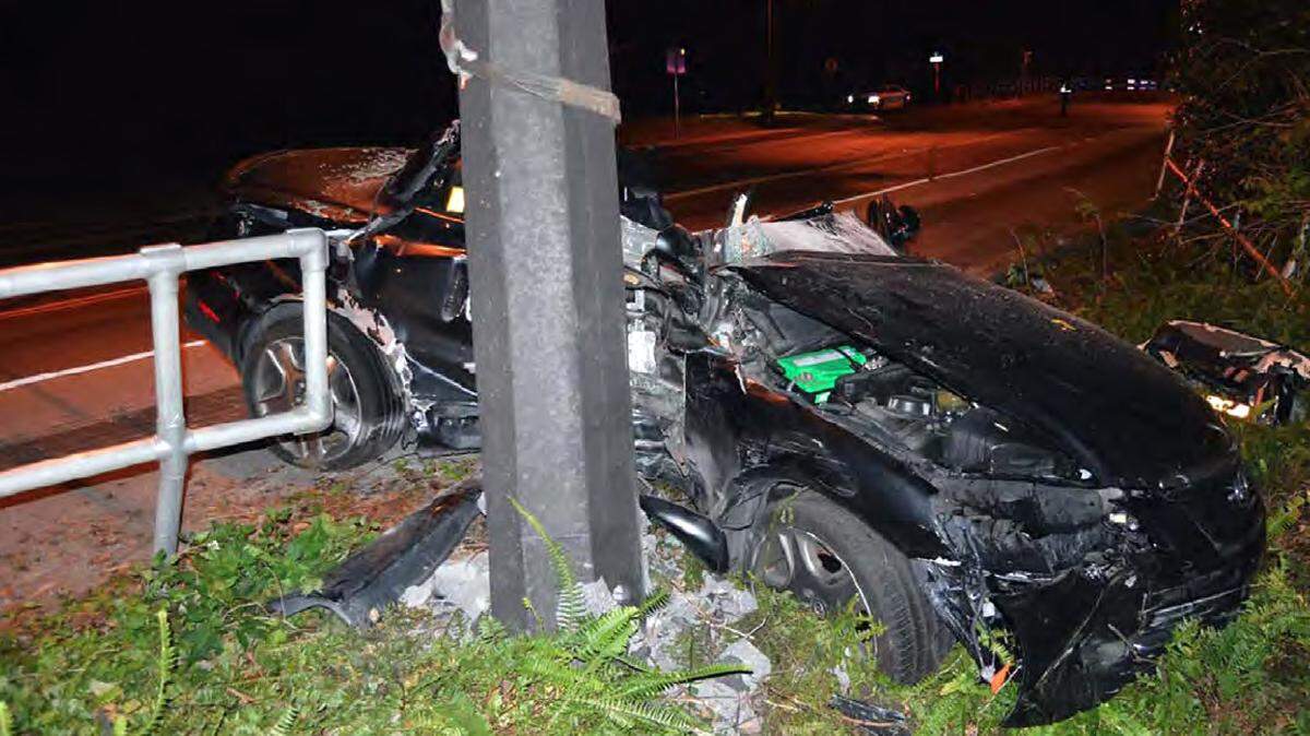 A 2007 Lexus driven by Adam Mandel, 19, is seen after crashing into a guardrail on West University Avenue in Gainesville, Fla., on January 9, 2020. The passenger in the car, Kassandra Guzman-Ramirez, 20, was pronounced dead at the scene. Mandel is facing a civil suit and a criminal investigation following the crash.