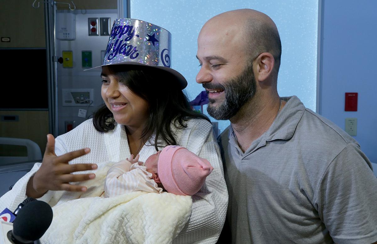Gabriela Herrera and Gabriel Parreiras hold their daughter Aryah Parreiras, Miami-Dade County’s first baby of the new year. She was born at Holtz Children’s Hospital at Jackson Memorial Hospital at 12:05 a.m. Jan. 1, 2019, weighing 8 pounds, 6 ounces, and measuring 20.8 inches. They work at Royal Caribbean Cruise Lines, where they met.