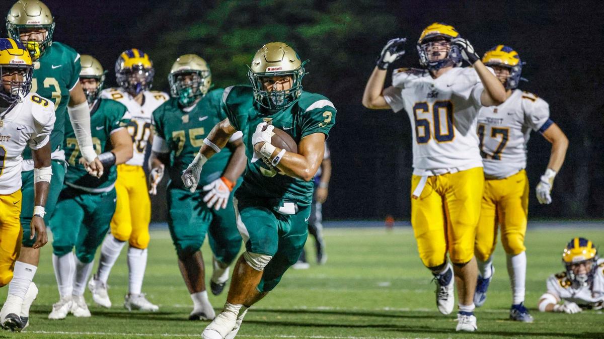 Immaculata-La Salle High School’s Santiago Robles (3) scores against Belen Jesuit in the third quarter at Tropical Park Stadium in Miami, Florida, on Friday, September 6, 2024.