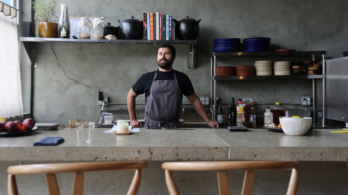 Chef Juan Camilo Liscano in the open kitchen of his restaurant Palma, located near the Miami River.