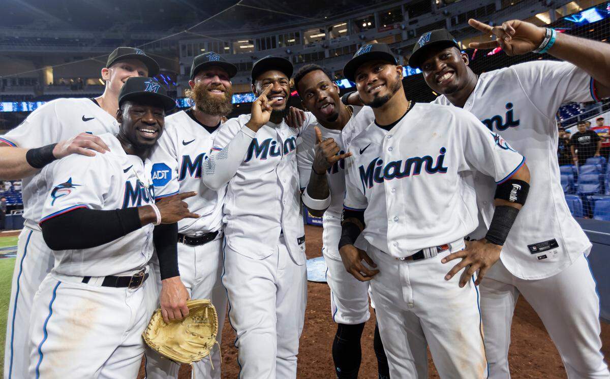 Miami Marlins second baseman Luis Arraez (3) celebrates with his teammates after having a 5-hit game against the Toronto Blue Jays in their MLB game at loanDepot park on Monday, June 19, 2023, in Miami, Fla. The Marlins defeated the Blue Jays 11 to 0.