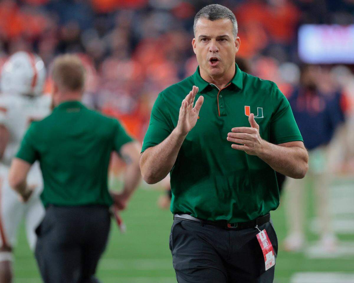 Miami Hurricanes head coach Mario Cristobal (pictured) landed the No. 1-ranked player in the 2025 transfer portal in former Georgia Bulldogs starting quarterback Carson Beck.