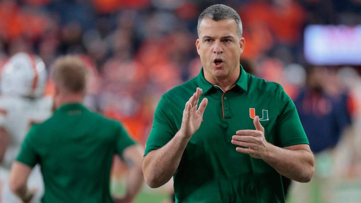 Miami Hurricanes head coach Mario Cristobal (pictured) landed the No. 1-ranked player in the 2025 transfer portal in former Georgia Bulldogs starting quarterback Carson Beck.