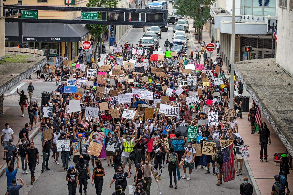 Protesters march in downtown Miami on Friday, June 12, 2020.